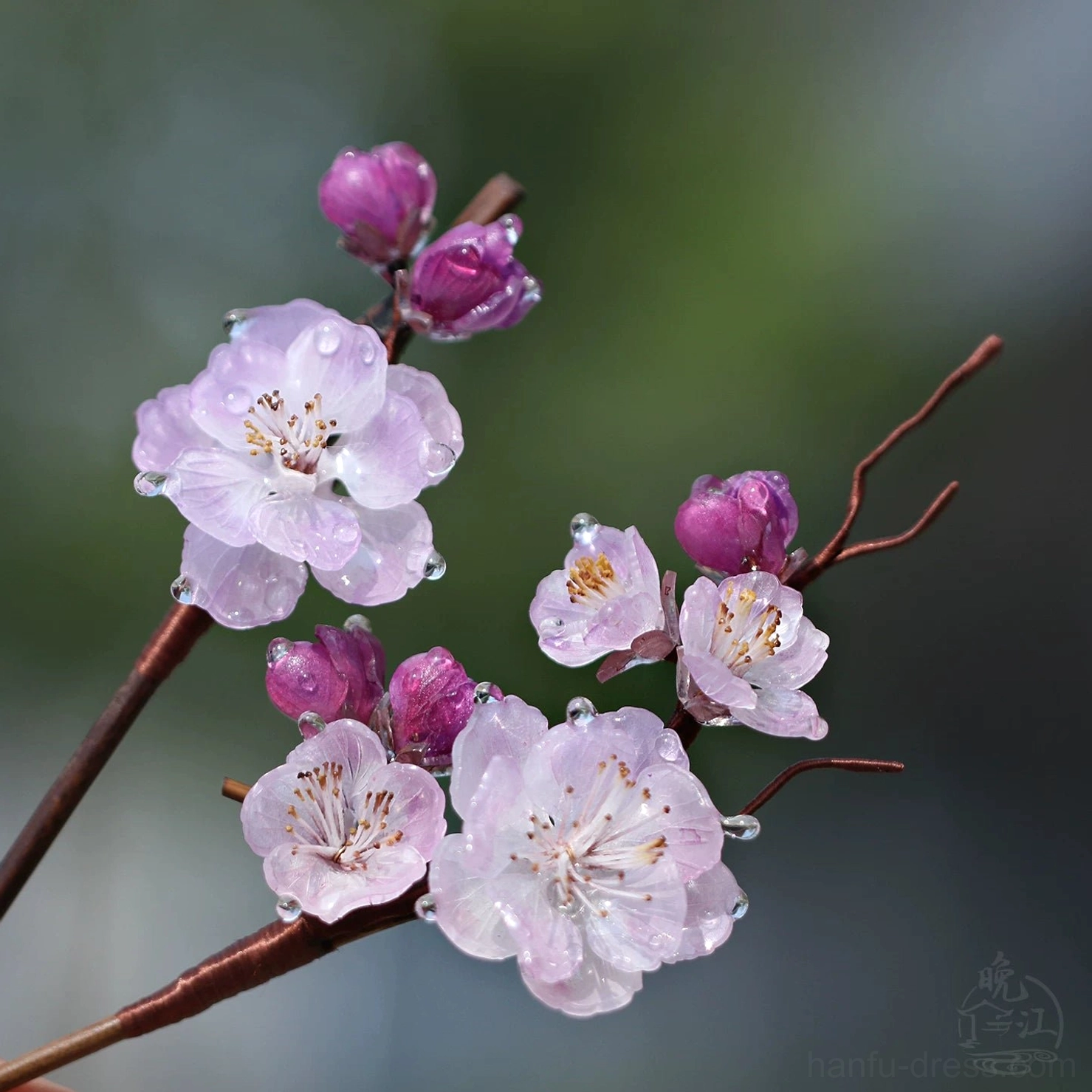 Detailed pink plum blossom Chinese hair stick with abundant flowers, translucent petal accents, purple buds, and a natural brown stem