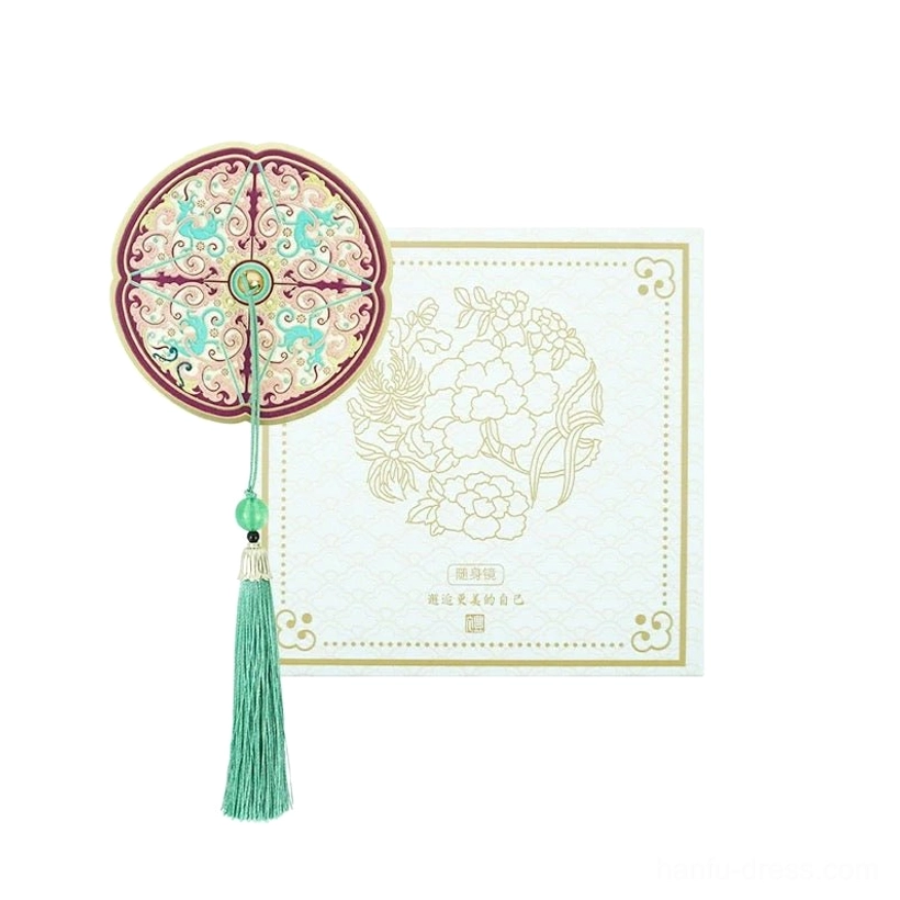 Amethyst purple Chinese pocket mirror with colorful traditional engravings, cyan tassel, jade-like beads, and a gilded floral gift card