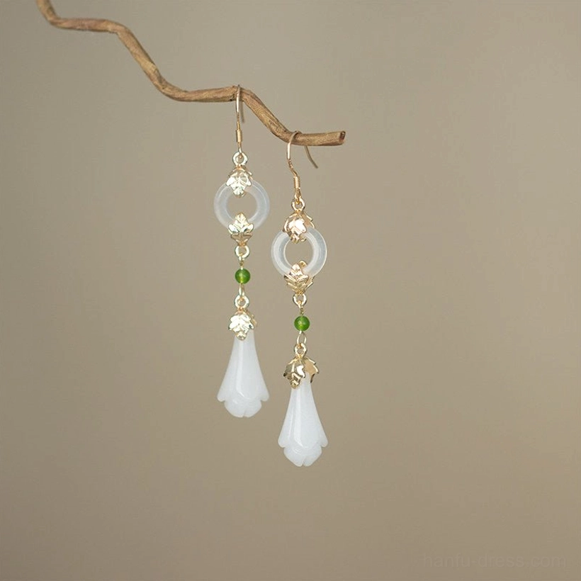 Complete pair of antique magnolia Hanfu hook earrings with 925 silver hooks white floral pendants jade-look circular charms and green bead accents