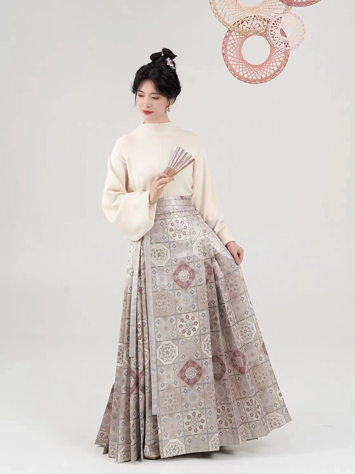 Apricot bell sleeve knit top and vintage geometric print mamian skirt Hanfu outfit with folding fan
