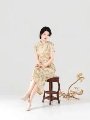 Woman seated in Apricot Branch modern Chinese style short sleeve cheongsam dress showing side slit