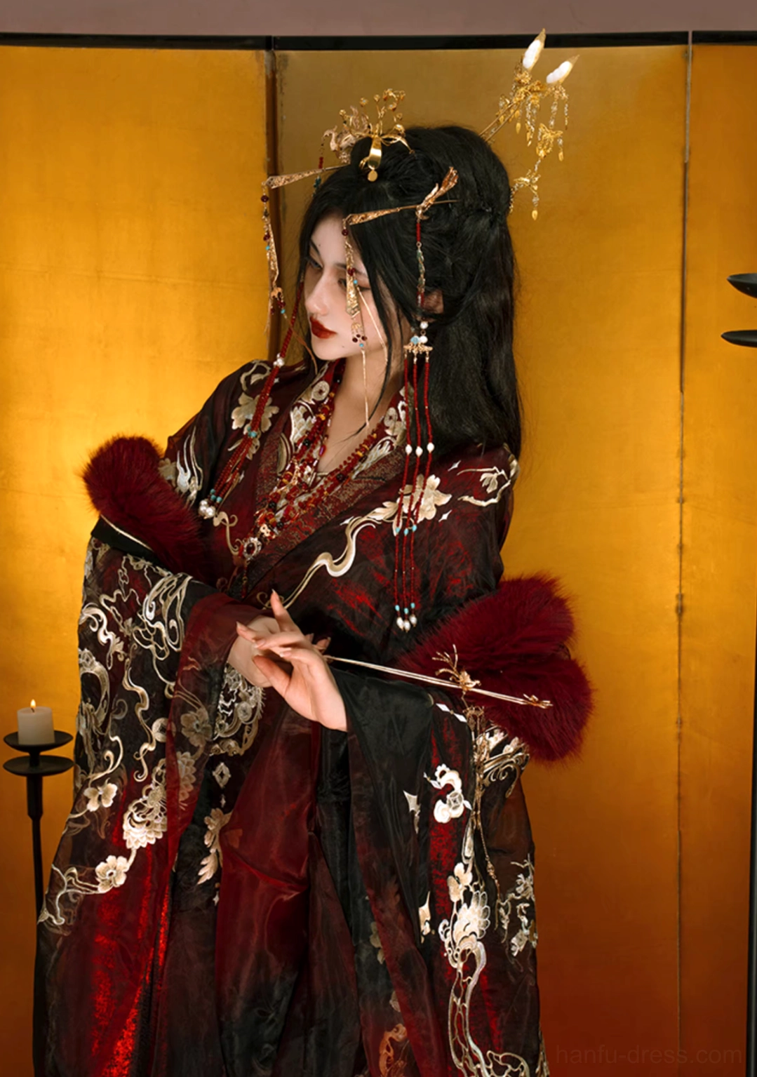 Side profile of red and black embroidered Qiyao Ruqun Hanfu with layered jewelry gold cross collar and elegant hairpin styling