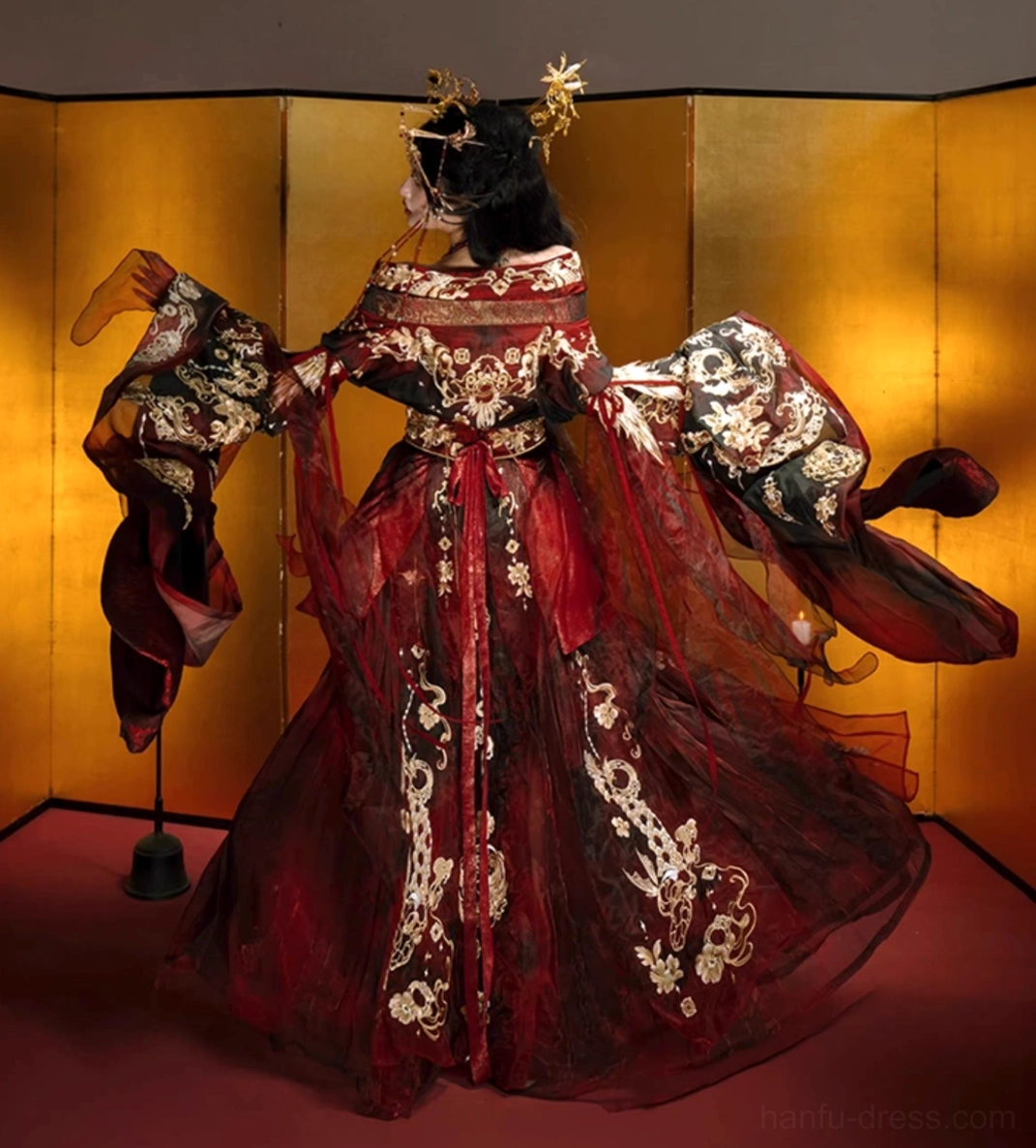 Back side view of Autumn Dragon Wei Jin Dynasty Hanfu with gold embroidery flowing skirt train sheer draped accents and dramatic sleeves