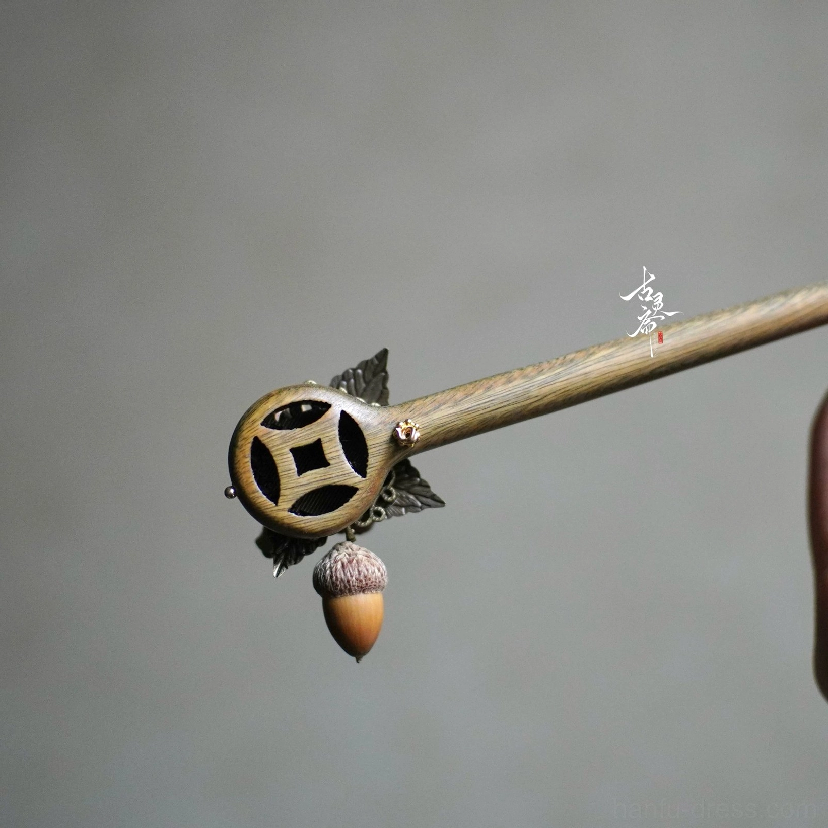 Detailed bronze openwork coin motif on autumn forest Chinese hair stick with acorn pendant and leaf ornament