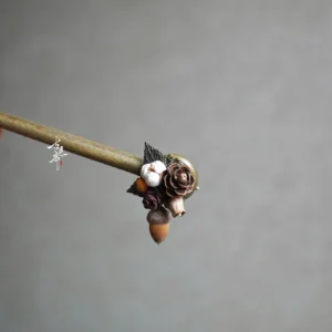 Autumn forest pine wood Chinese hair stick with dried rose cotton pine cone and acorn charm on gray background