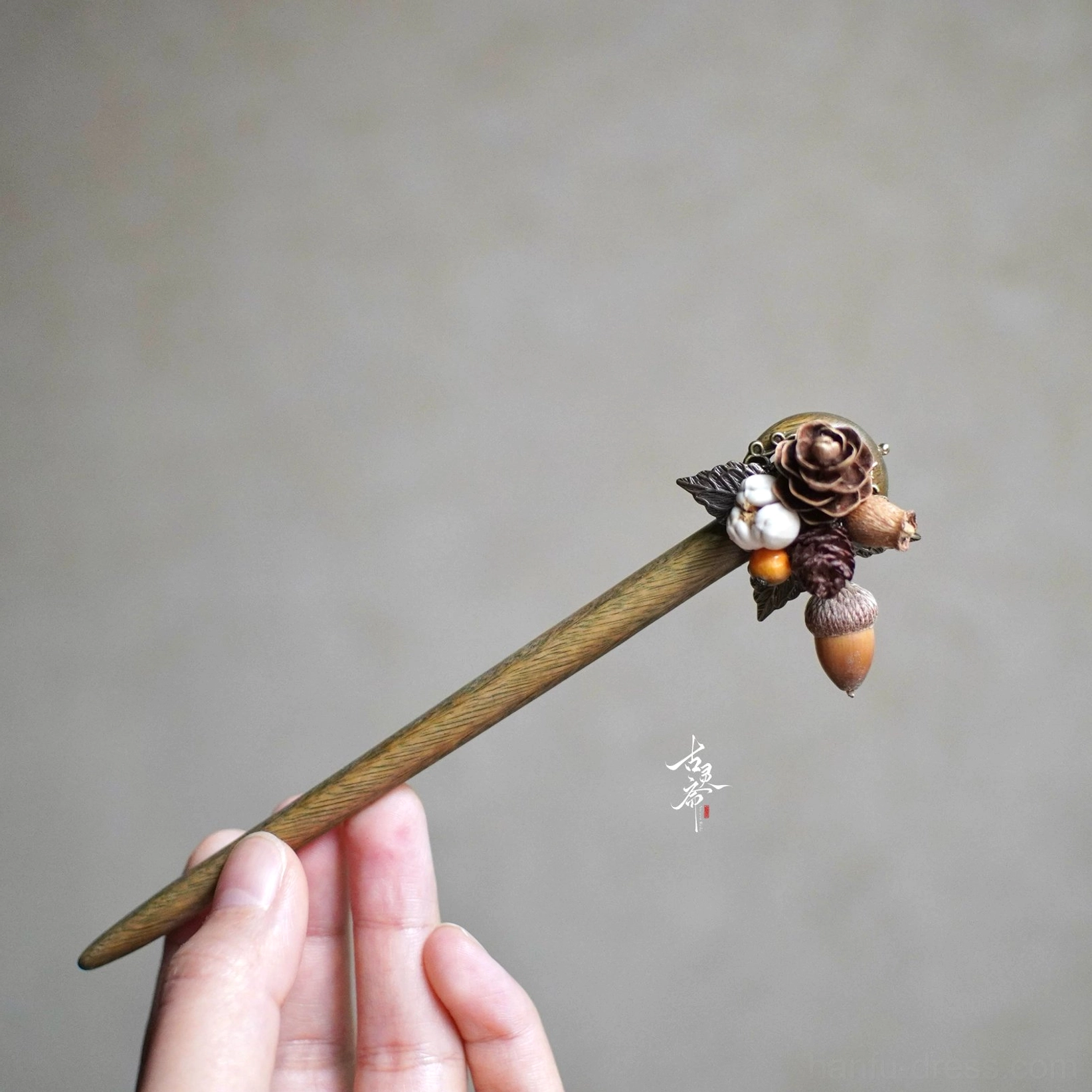 Handheld autumn woodland Chinese wooden hair pin with tapered wood shaft dried florals and acorn charm