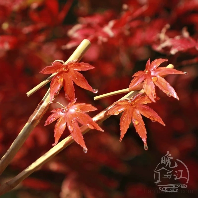 Autumn-inspired Chinese hair sticks with multiple scarlet maple leaf motifs and smooth glossy finish