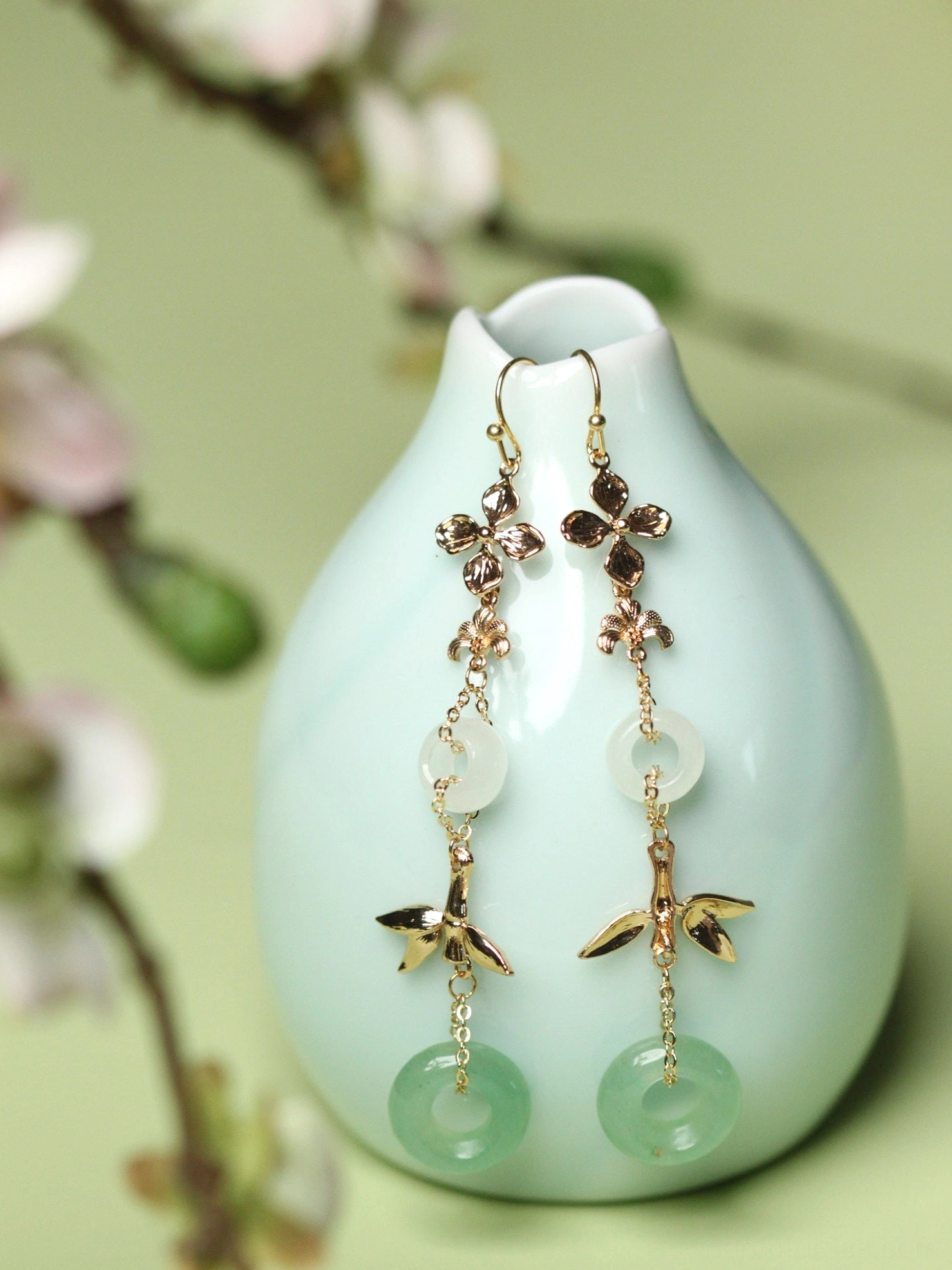 Chinese Hanfu dangle earrings with gold flower and bamboo details white jade-tone rings and aventurine green circular pendants