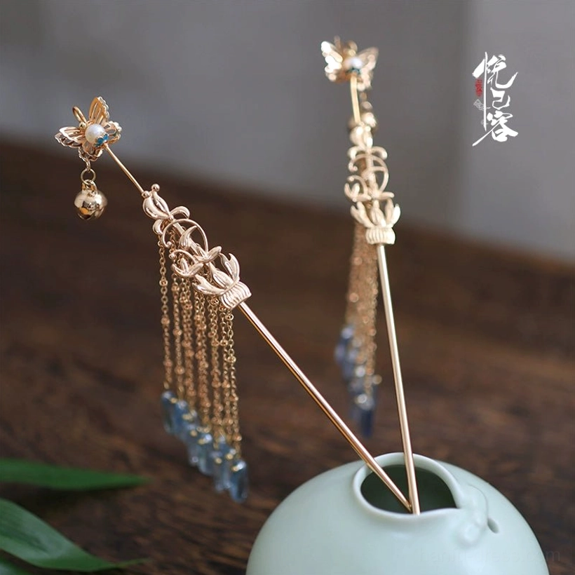 Pair of gilt-tone Chinese Hanfu hairpins with butterfly finial openwork metalwork chain tassels and blue grey waterdrop pendants