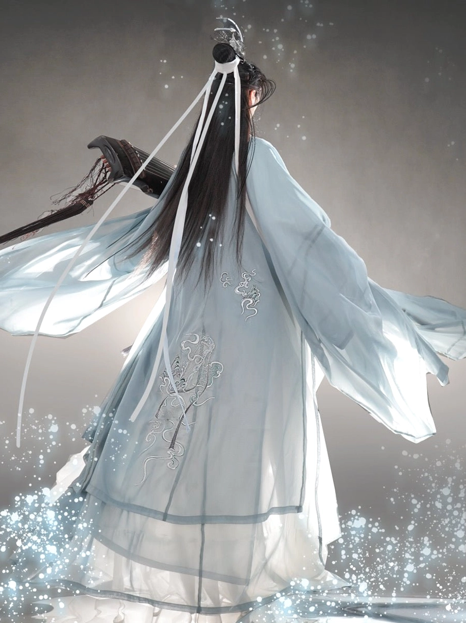 Back view of Wei Jin xianxia hanfu for men showing robe embroidery, long flowing hair ribbons, and traditional hair ornaments