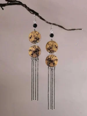 Front close-up of bamboo leaf round tassel earrings with silver hooks, black beads, ink-style bamboo print pendants, and long black chain tassels for Hanfu styling
