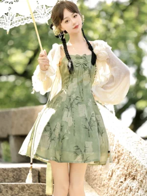 Modern Hanfu bamboo print mint green slip dress with off white knit sun cardigan styled in a classical Chinese garden