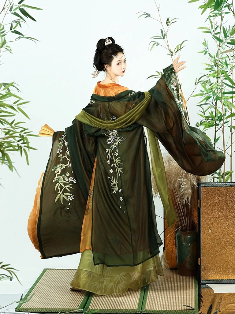 Bamboo Stream Tang Dynasty Hanfu heziqun back view showing dark green embroidered wide sleeves orange inner lining and waist sash