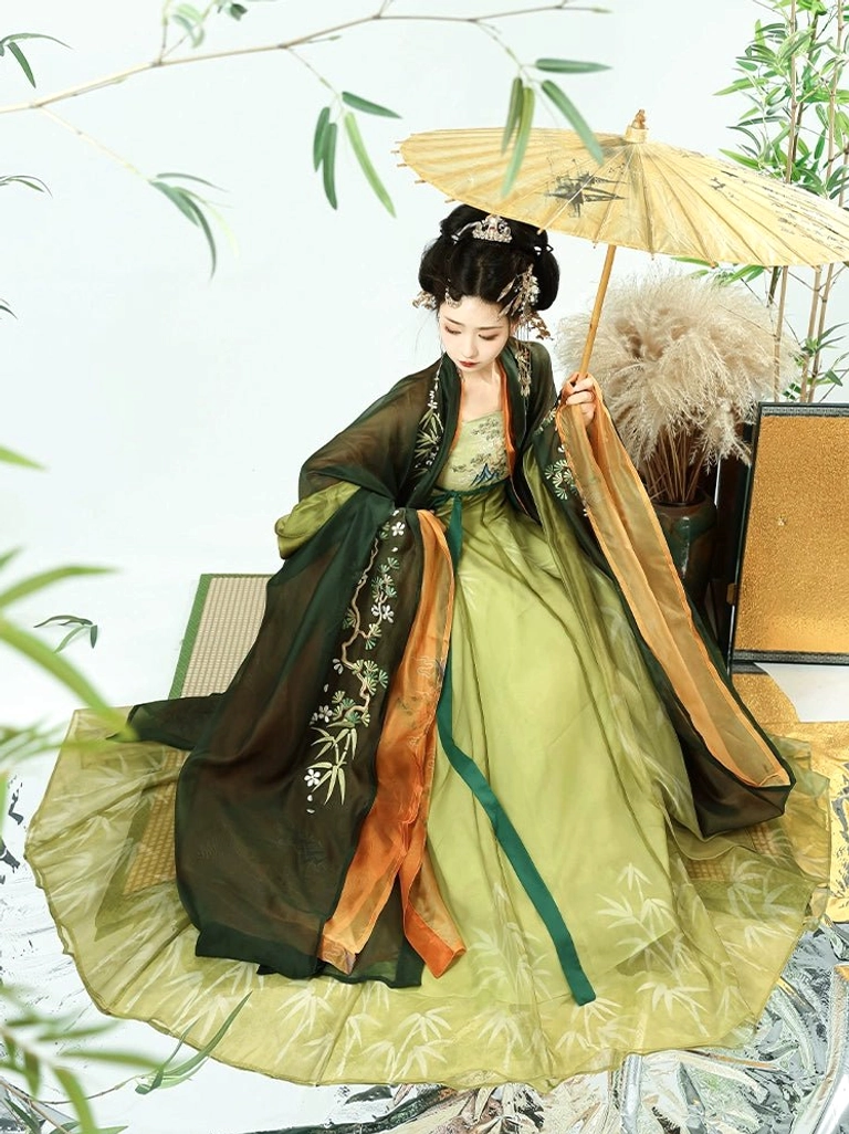 Tang Dynasty bamboo stream hanfu heziqun full length front view with flowing bamboo print hem layered wide sleeves and oil paper umbrella