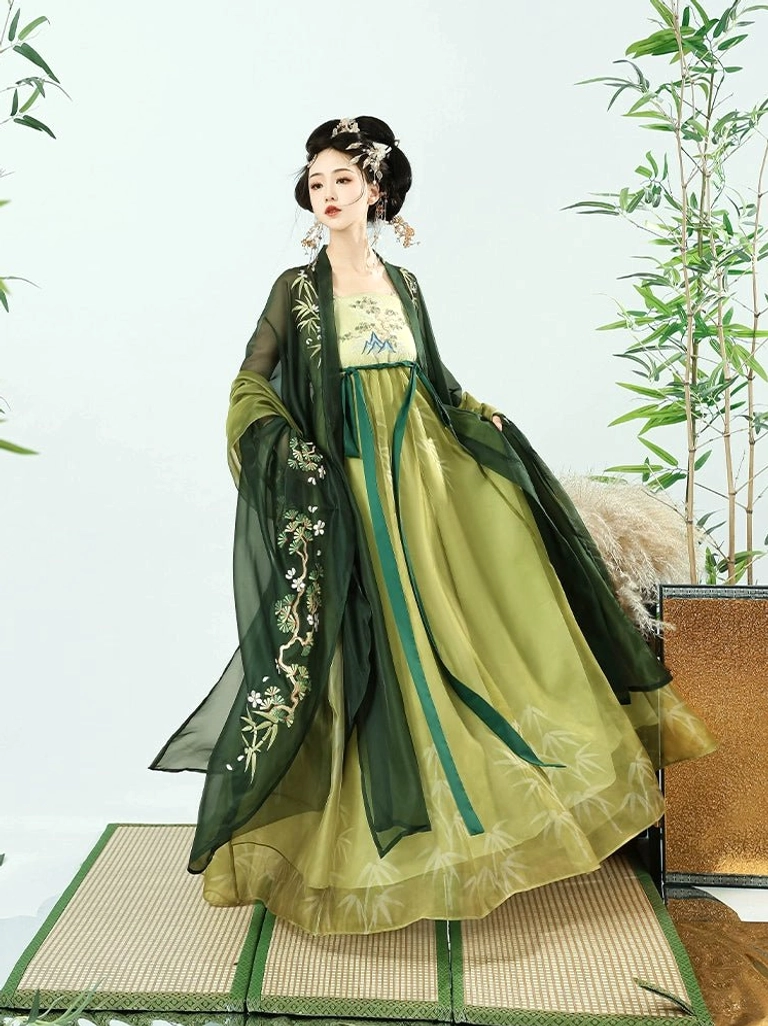 Tang Dynasty style bamboo stream hanfu heziqun three quarter front view showing dark green embroidered wide sleeves and layered skirt
