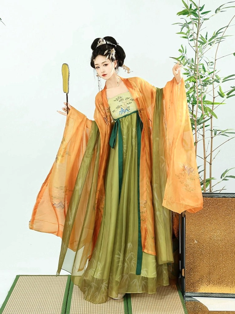 Bamboo Stream Tang Dynasty hanfu dress side view with orange gradient outer layer olive green heziqun skirt and traditional Chinese hand fan