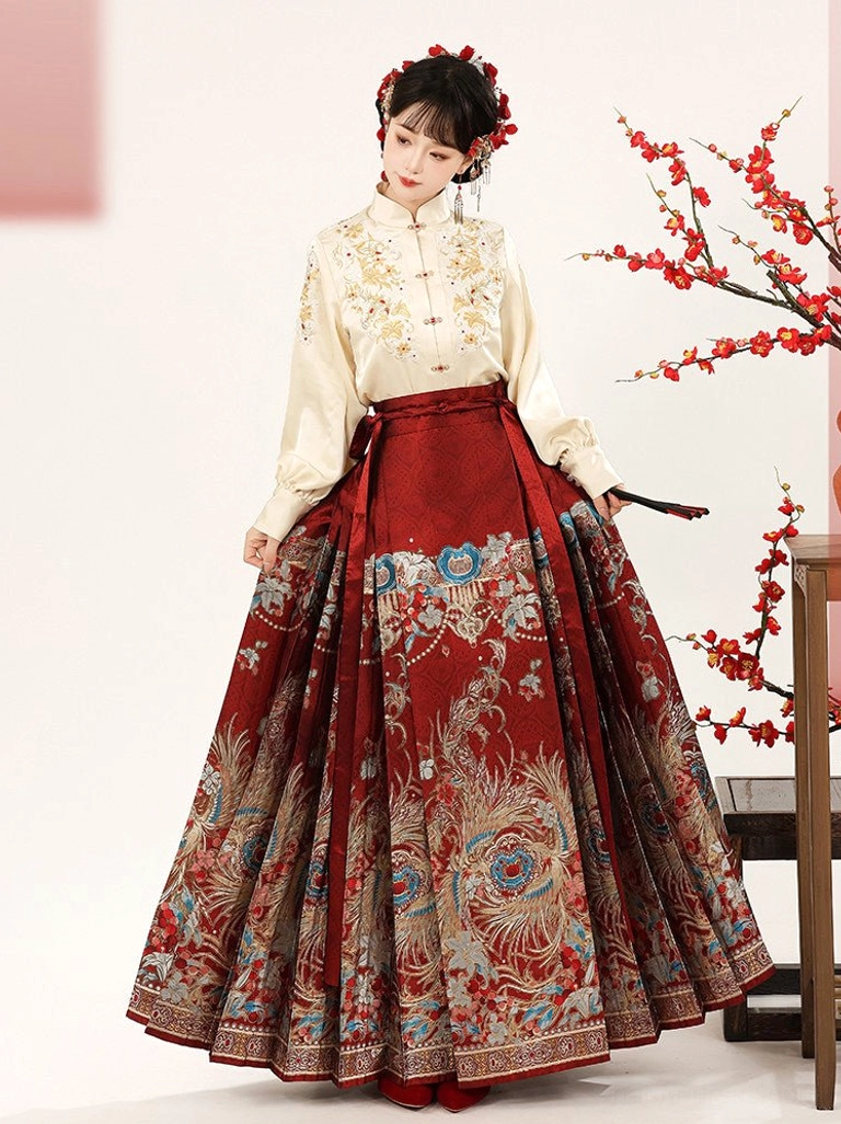 Beige and red Ming Dynasty Hanfu Chinese New Year dress with lantern sleeve blouse and patterned mamian skirt front view