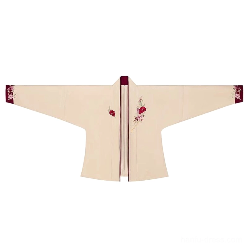 Flat lay of a beige Song Dynasty hanfu cross-collar inner top with wide sleeves, red plum blossom embroidery, and hidden front placket