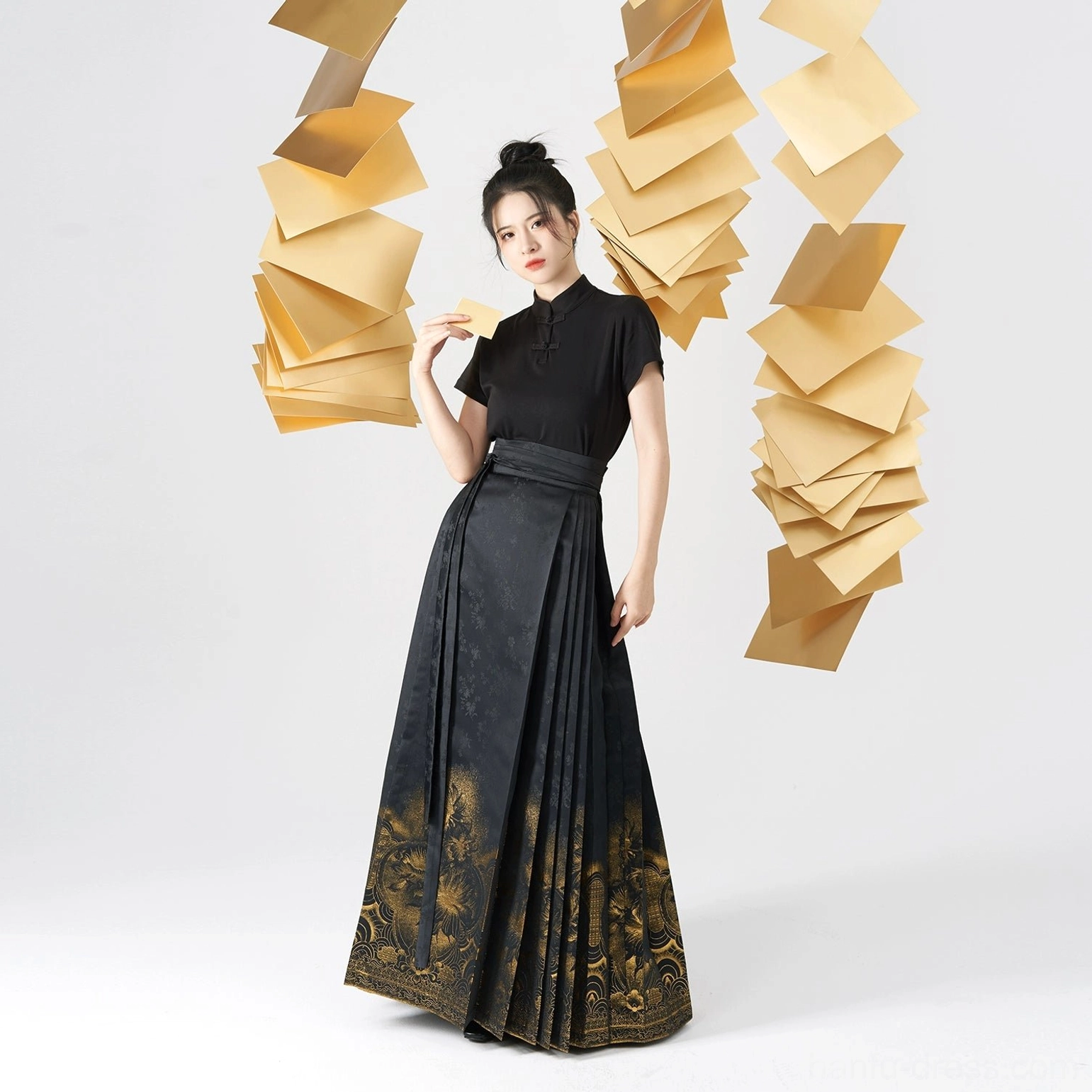 Black Chinese Hanfu blouse and golden epiphyllum mamian skirt daily outfit shown in a three-quarter full-body studio view