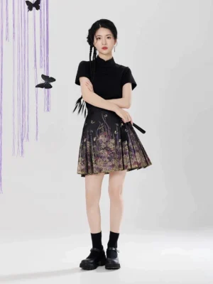 Front view of black floral mini mamian skirt with pleated sides and Chinese inspired cropped blouse styling