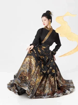 Black and gold Ming Dynasty Hanfu mamianqun full set shown in a three-quarter front view with gold cloud and landscape skirt motifs