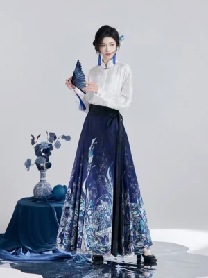 Front view of black Hanfu long sleeve top and navy blue phoenix horse face skirt with folding fan
