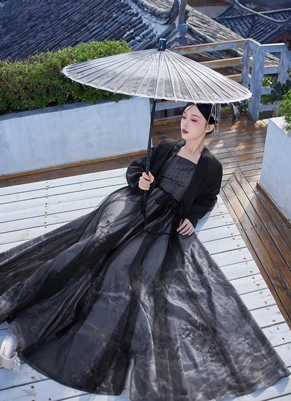 Black ink print modern Hanfu outfit with floor length tulle skirt waist sash traditional hairstyle and Chinese paper umbrella