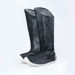 Front view of black breathable mesh traditional Chinese Hanfu boots with upturned toes, tall calf-high shaft, and contrasting white rubber sole