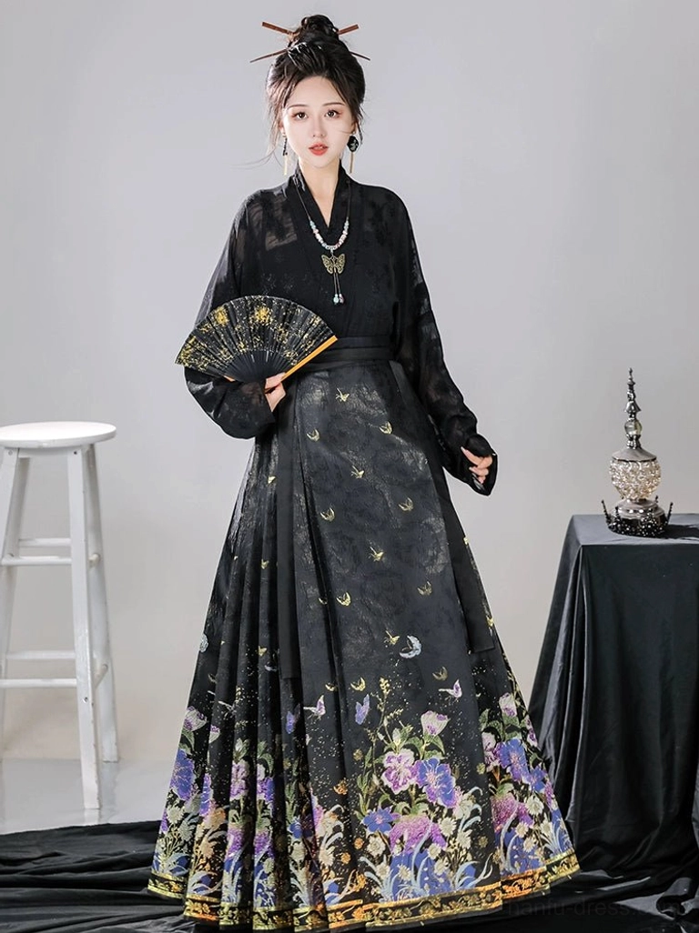 Black floral mamianqun horse face skirt in a full front modern Ming Dynasty Hanfu look with black cross-collar blouse