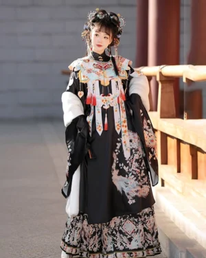 Black Ming Dynasty Hanfu set with embroidered phoenix cloud collar, wide sleeves, floral details, and mamian skirt photographed in a traditional Chinese courtyard