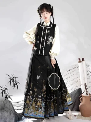 Front view of black Ming-inspired Hanfu outfit featuring embroidered vest, ivory stand collar blouse, and patterned mamianqun horse face skirt