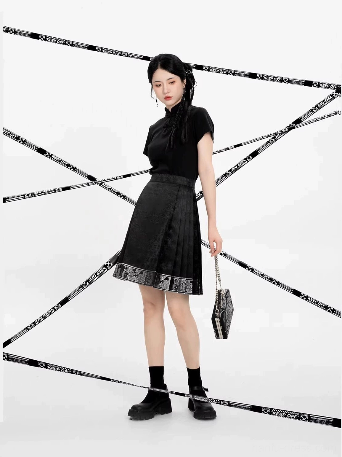 Full-body front styling of a black mini mamian skirt with Chinese-style blouse, black crew socks, and thick-soled shoes