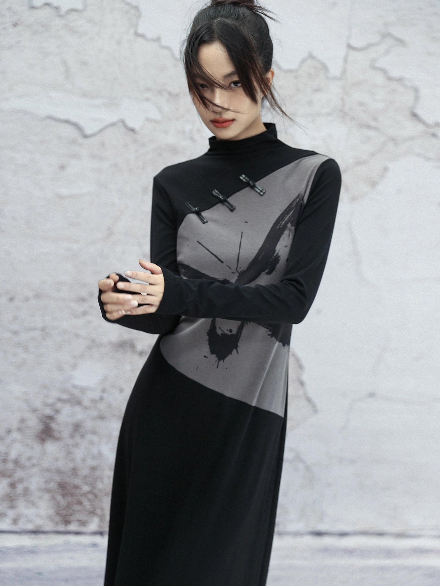 Detailed upper body view of black modern Hanfu dress featuring traditional Chinese frog buttons and monochrome butterfly ink art