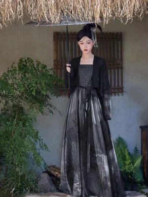 Black modern Hanfu dress with gradient grey ink print maxi skirt and matching cropped cardigan styled with a traditional Chinese oiled paper umbrella