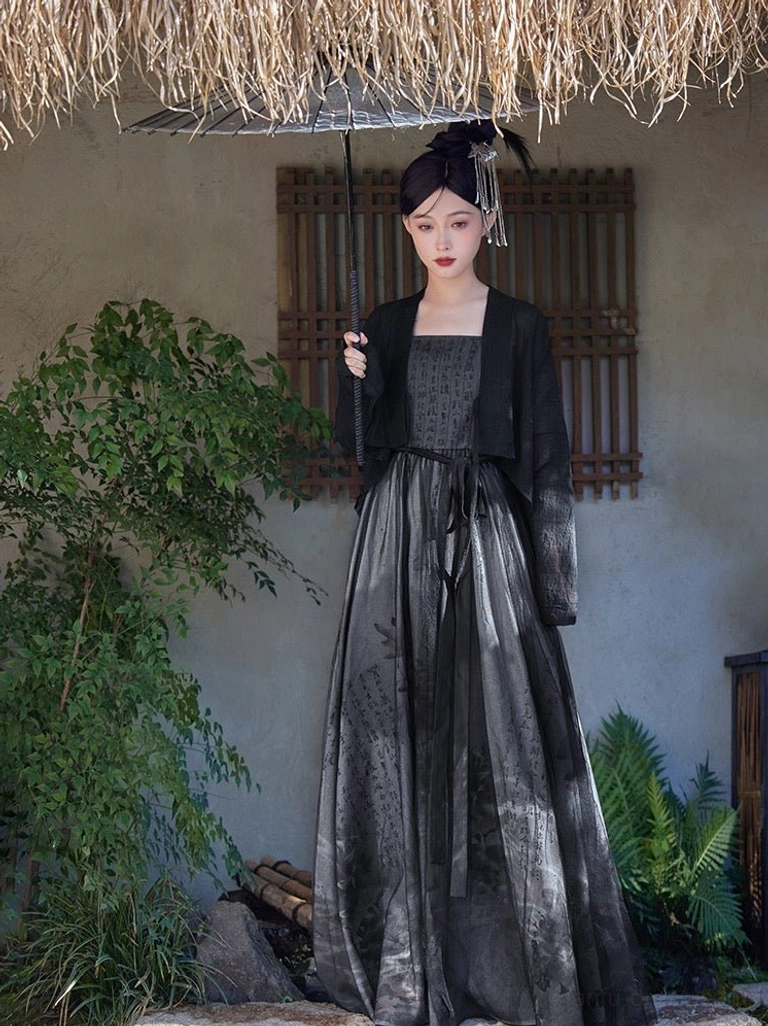 Black modern Hanfu dress with gradient grey ink print maxi skirt and matching cropped cardigan styled with a traditional Chinese oiled paper umbrella