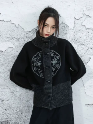 Black modern Hanfu knit cardigan with grey circular chest motif, ribbed trim and traditional Chinese frog button closures
