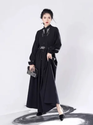Black modern Ming Dynasty Hanfu dress three quarter side view featuring embroidered waist belt and flowing maxi skirt