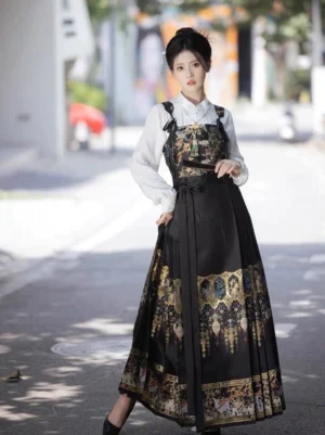 Black modern Ming Dynasty hanfu bustier and embroidered mamianqun horse face skirt set styled with a white stand-collar blouse and folding fan outdoors