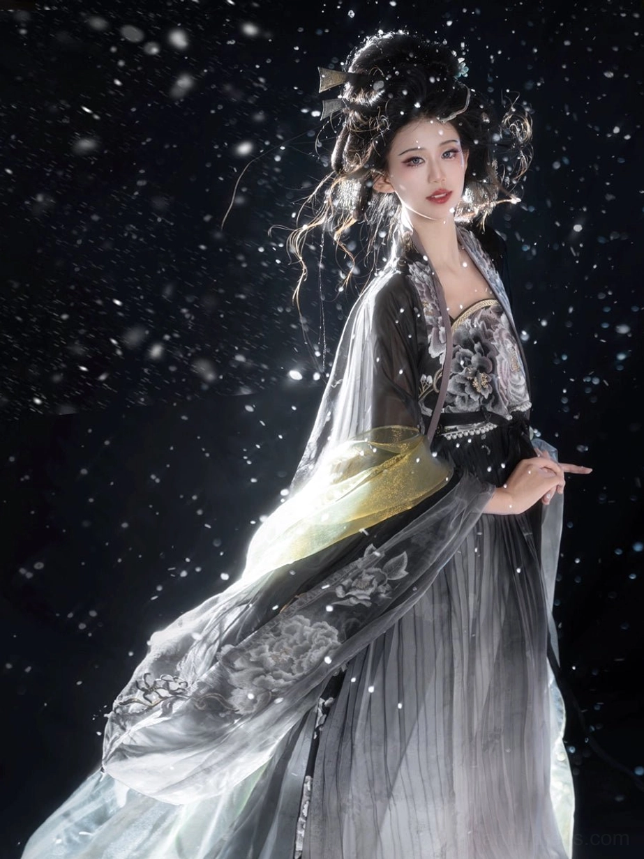 Back three-quarter view of Black Peony Tang Dynasty style Hanfu dress set, featuring large peony embroidery on the dark gradient skirt and layered flowing sleeves