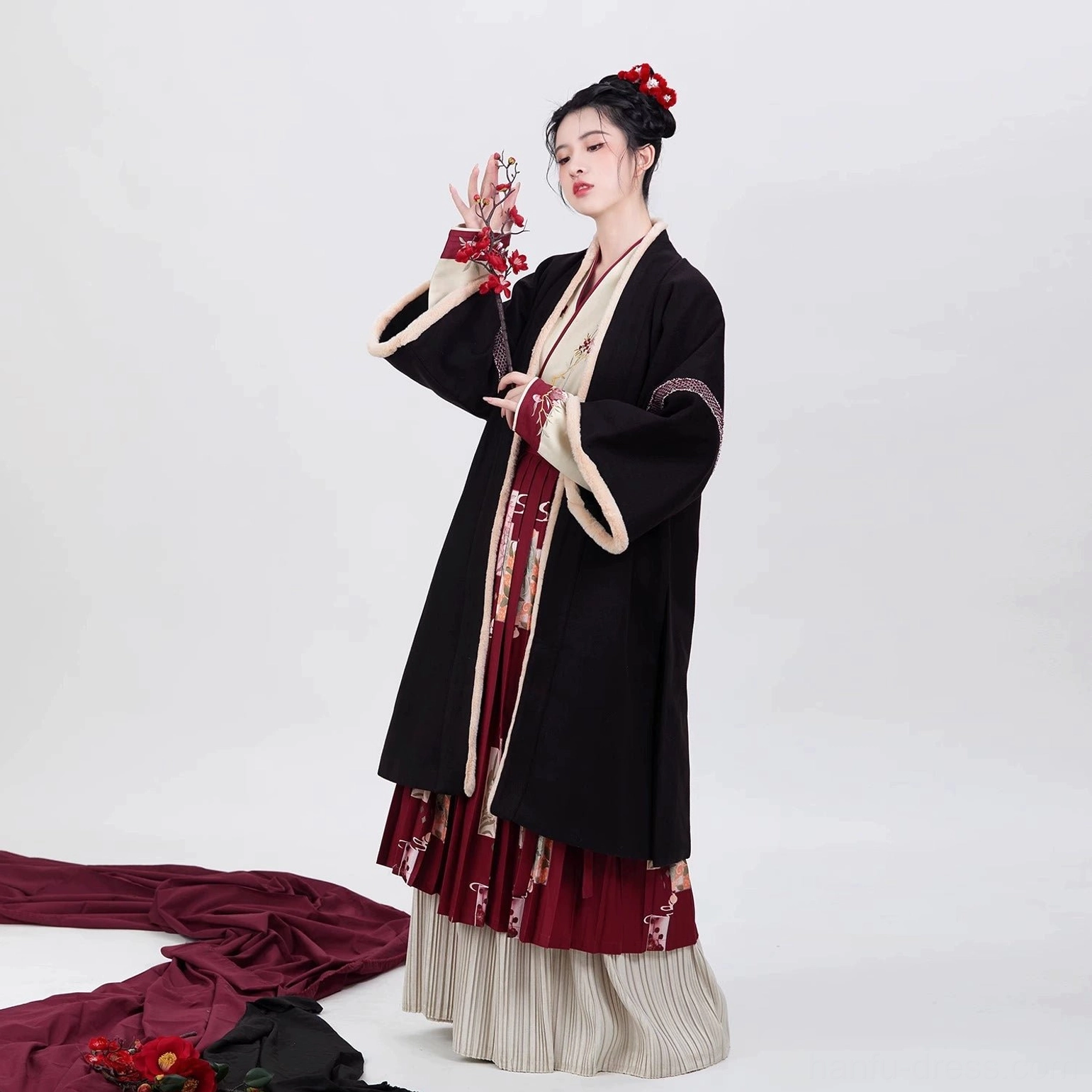 Black and red Song Dynasty modern hanfu ensemble with floral embroidery, seasonal flower pleated skirt, wide sleeves, and elegant outer robe
