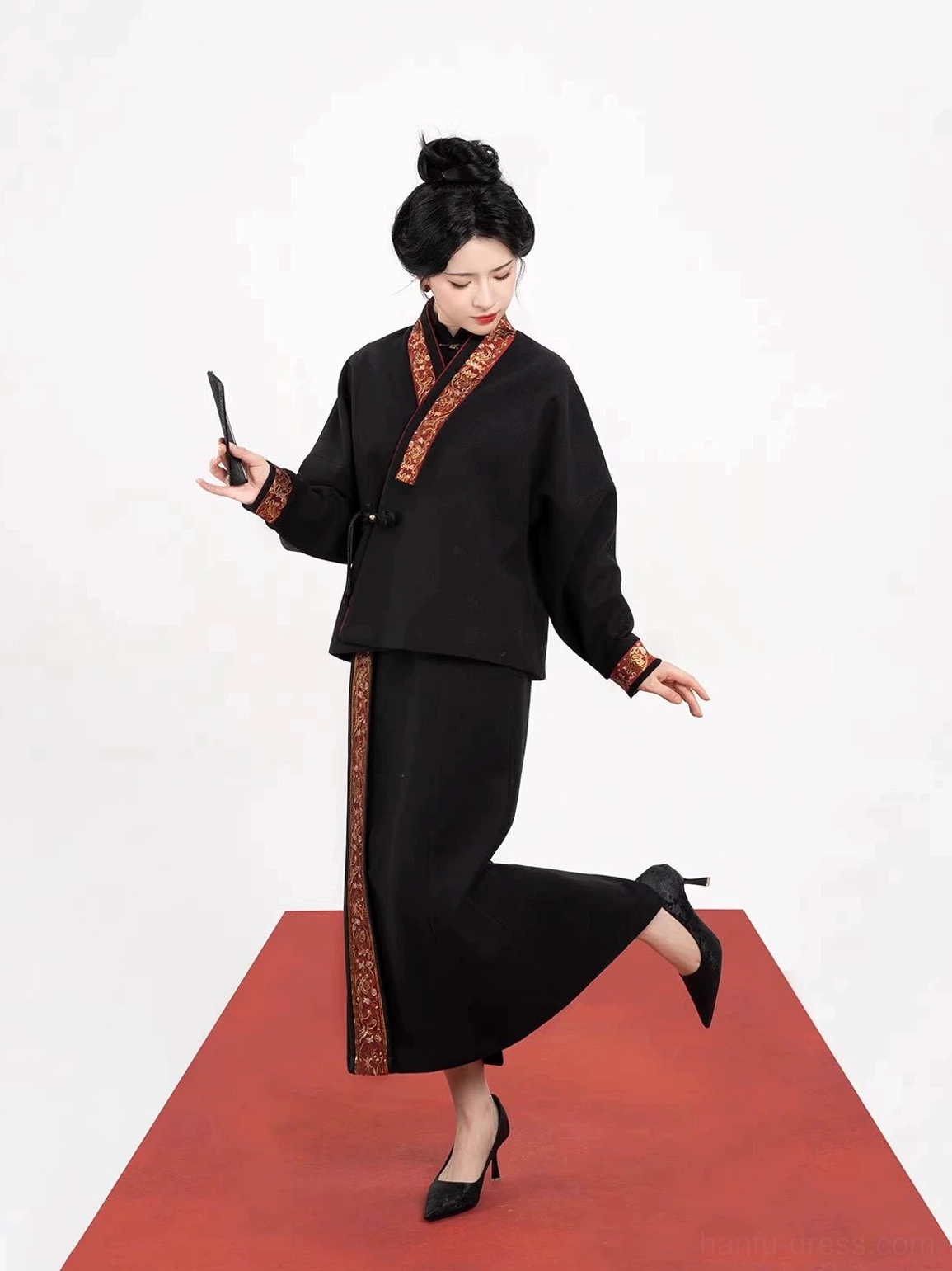 Dynamic full-body styling of an elegant black two-piece Chinese Hanfu outfit with Dunhuang scroll embroidery and long skirt