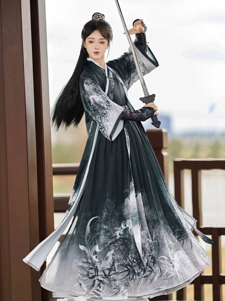 Side view of a black ink-wash Wei Jin Dynasty Qiyao Ruqun Hanfu with a long flowing botanical print skirt, cross-collar robe, metal waist belt, and dark protective bracers beside a riverside terrace