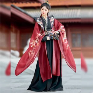Three-quarter view of black and wine red Chinese hanfu costume with floral embroidered collar, flowing wide sleeves, sheer chiffon robe, and decorative waist accessory for wuxia cosplay