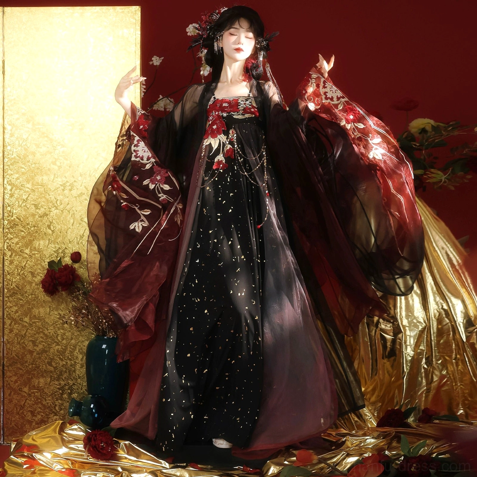 Front medium full view of black and wine red Tang style Qixiong Ruqun Hanfu with embroidered bodice, gradient sheer outer layers, gold-speckled black skirt, and raised hand pose