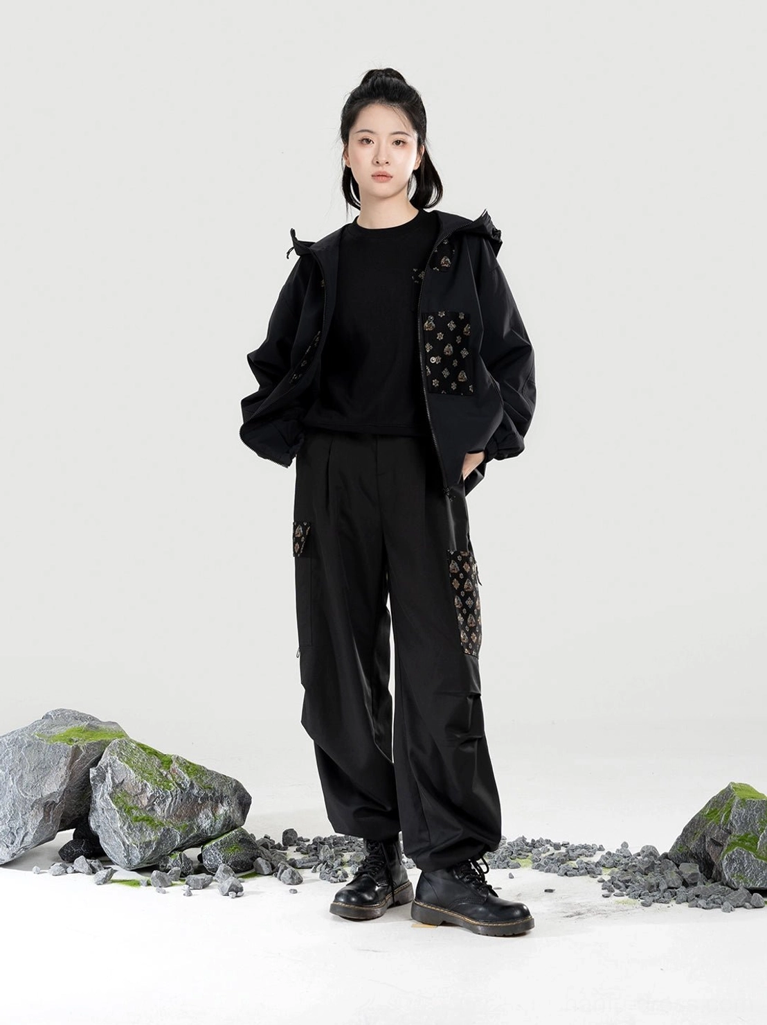Black women’s Modern Hanfu hooded jacket and matching utility cargo pants two-piece outfit with traditional pattern accents