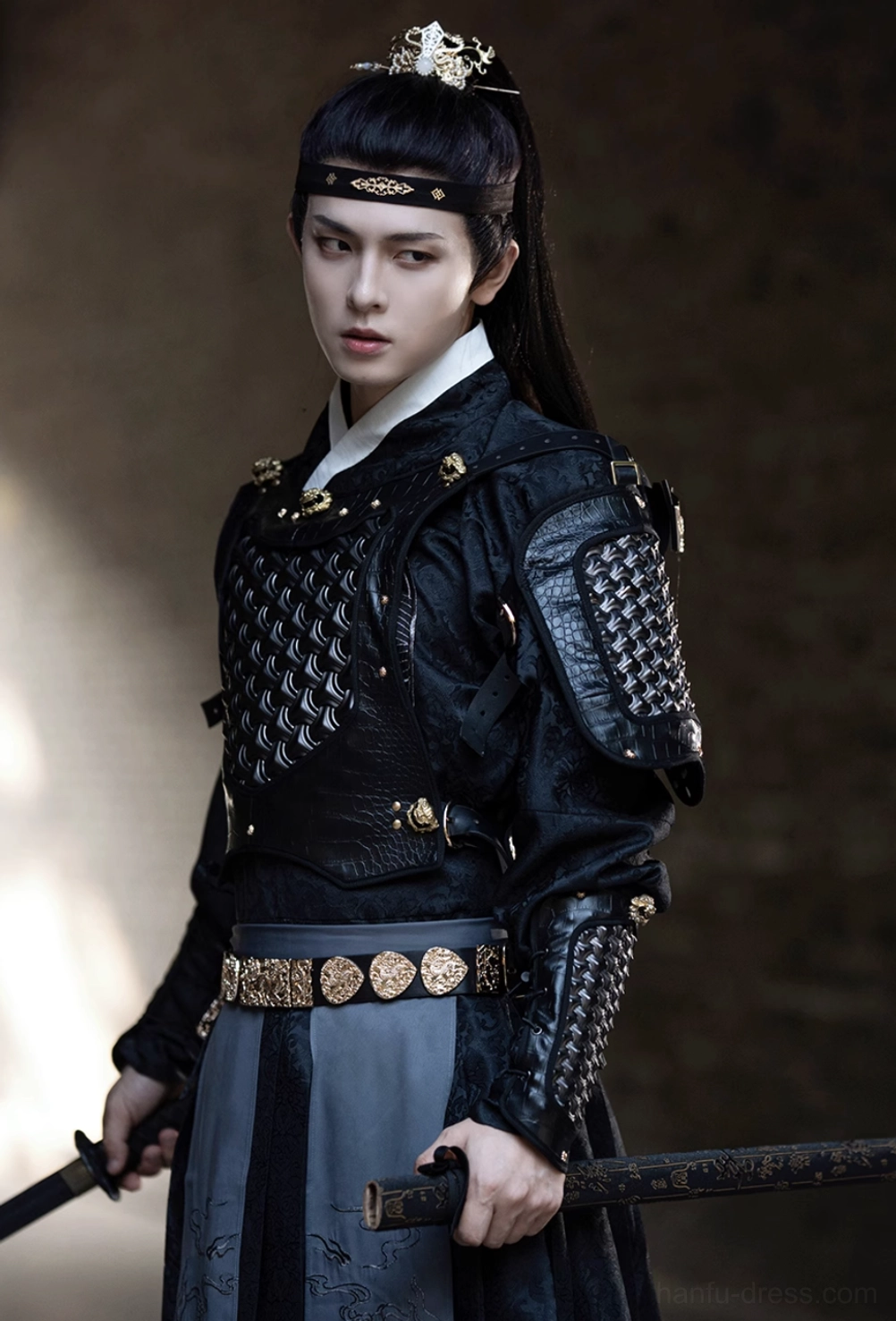 Front half body view of black xianxia general armor hanfu with scale-textured chest armor, gold waist ornaments, shoulder pauldrons, and headband