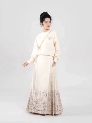 Three-quarter view of a blooming lotus modern Hanfu outfit featuring a cream pleated mamianqun skirt with subtle gradient fabric