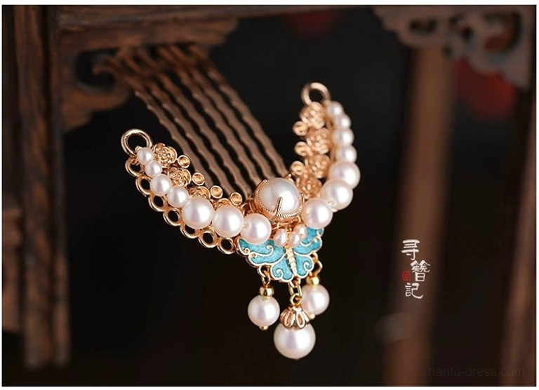 Blue butterfly pearl tassel Chinese hair comb pin with gold-tone metal filigree shown from a left oblique view for Hanfu and qipao hairstyles