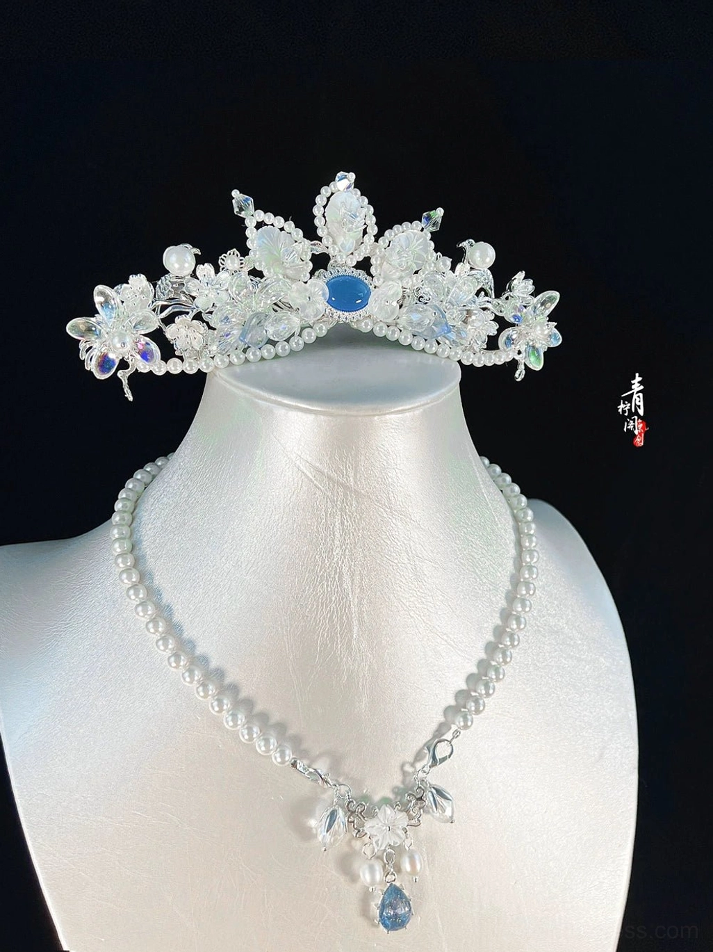 Compact blue crystal fairy tiara Chinese hanfu hair accessory with floral ornaments pearl beads and glass drop details on mannequin