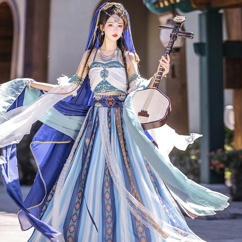 Three-quarter front view of blue Dunhuang Goddess Feitian Tang Dynasty princess Hanfu with embroidered waistband, flowing sleeve ribbons, layered skirt, and ruan lute in an ancient courtyard